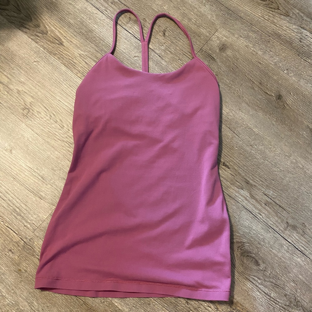 Like new. Lululemon tank top with built in bra. Size 4
